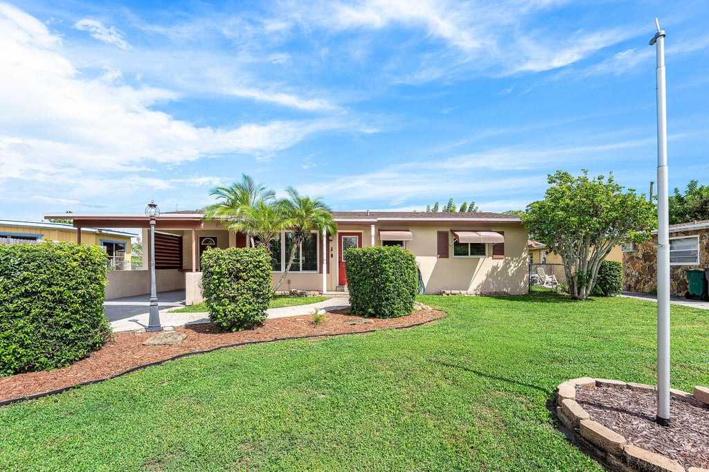 Photo of 740 Caroline Avenue, West Palm Beach, FL 33413 (MLS # B26085513)