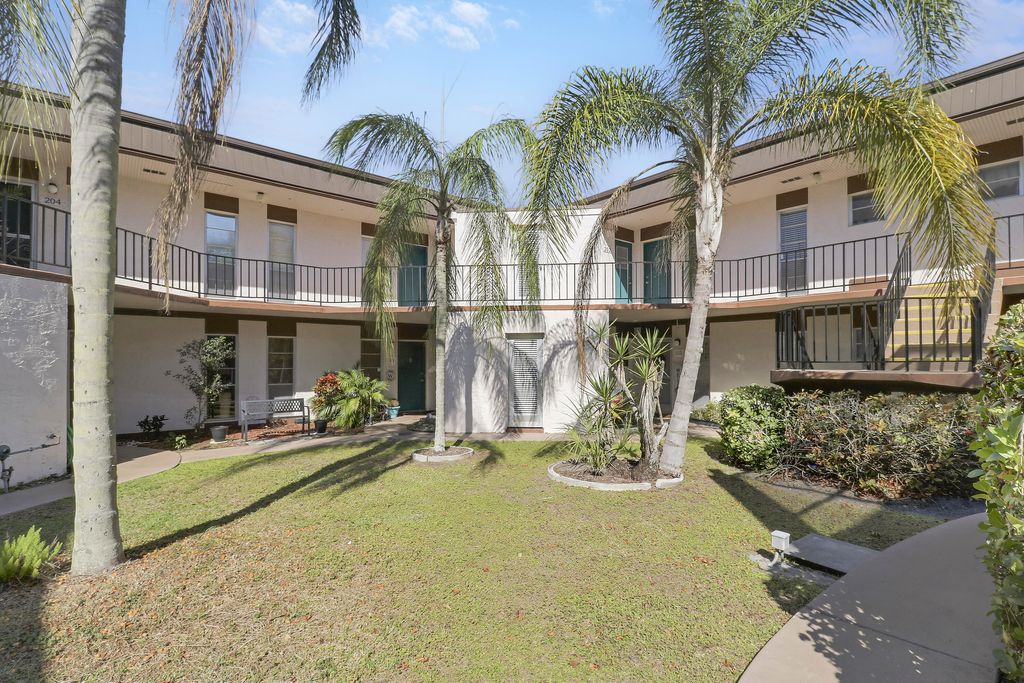 Photo of 7 Greenway Village Vlg N #202, Royal Palm Beach, FL 33411 (MLS # R11161808)