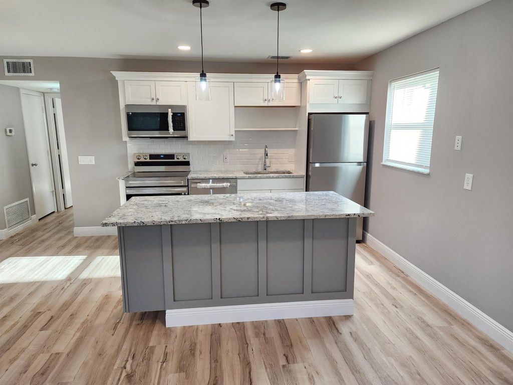 Photo of 10 Lake Vista Trail #105, Port Saint Lucie, FL 34952 (MLS # R11066936)