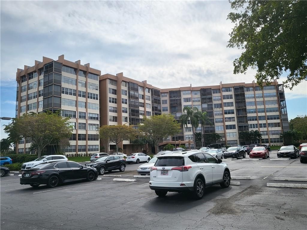 Photo of 1200 Saint Charles Pl #615, Pembroke Pines, FL 33026 (MLS # F10315933)