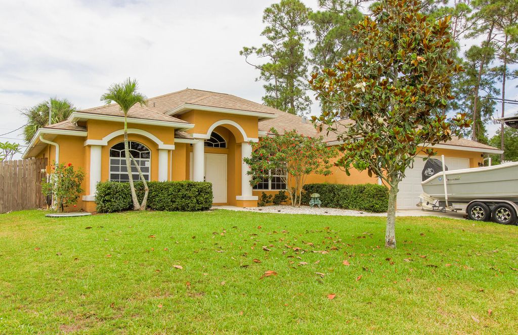 Photo of 1741 SW Commerce Avenue Ave, Port St Lucie, FL 34953 (MLS # R10794210)