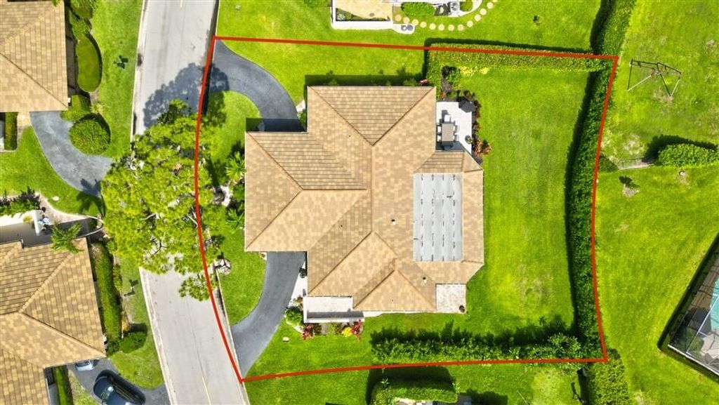 Photo of 429 Pine Villa Drive, Atlantis, FL 33462 (MLS # B26029592)