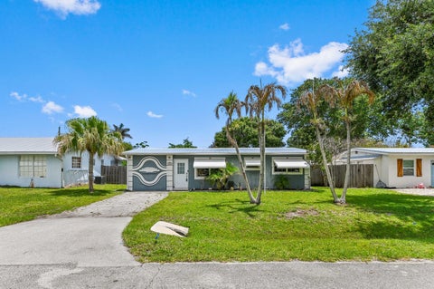 Photo of 5709 SE Indigo Avenue, Stuart, FL 34997 (MLS # R11159272)