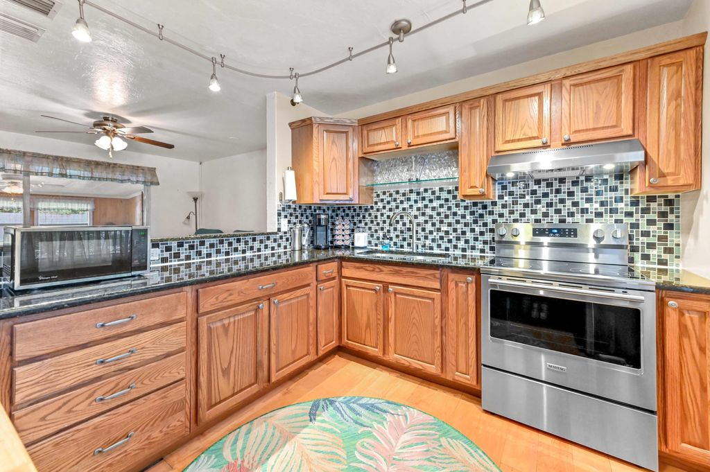 Photo of 5709 SE Indigo Avenue, Stuart, FL 34997 (MLS # R11159272)