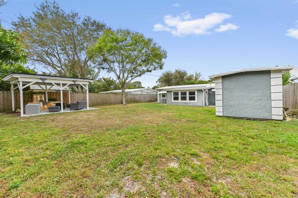 Photo of 5709 SE Indigo Avenue, Stuart, FL 34997 (MLS # R11159272)