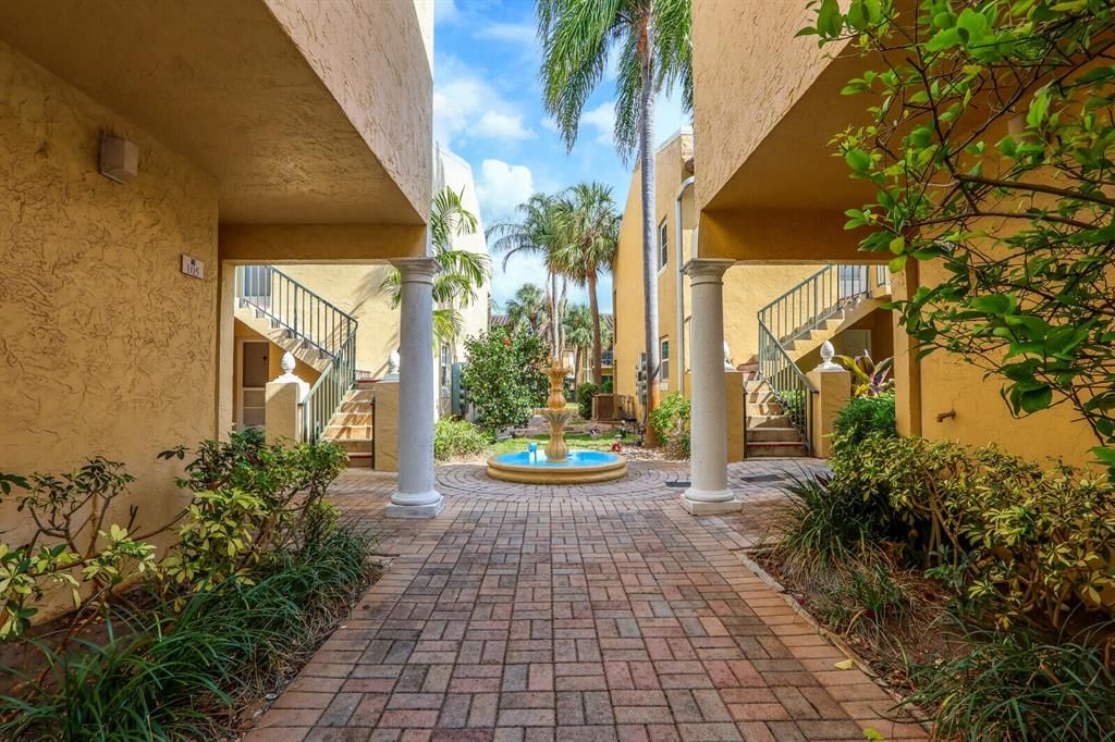 Photo of 1035 Lake Shore Dr #101, Lake Park, FL 33403 (MLS # R10879118)