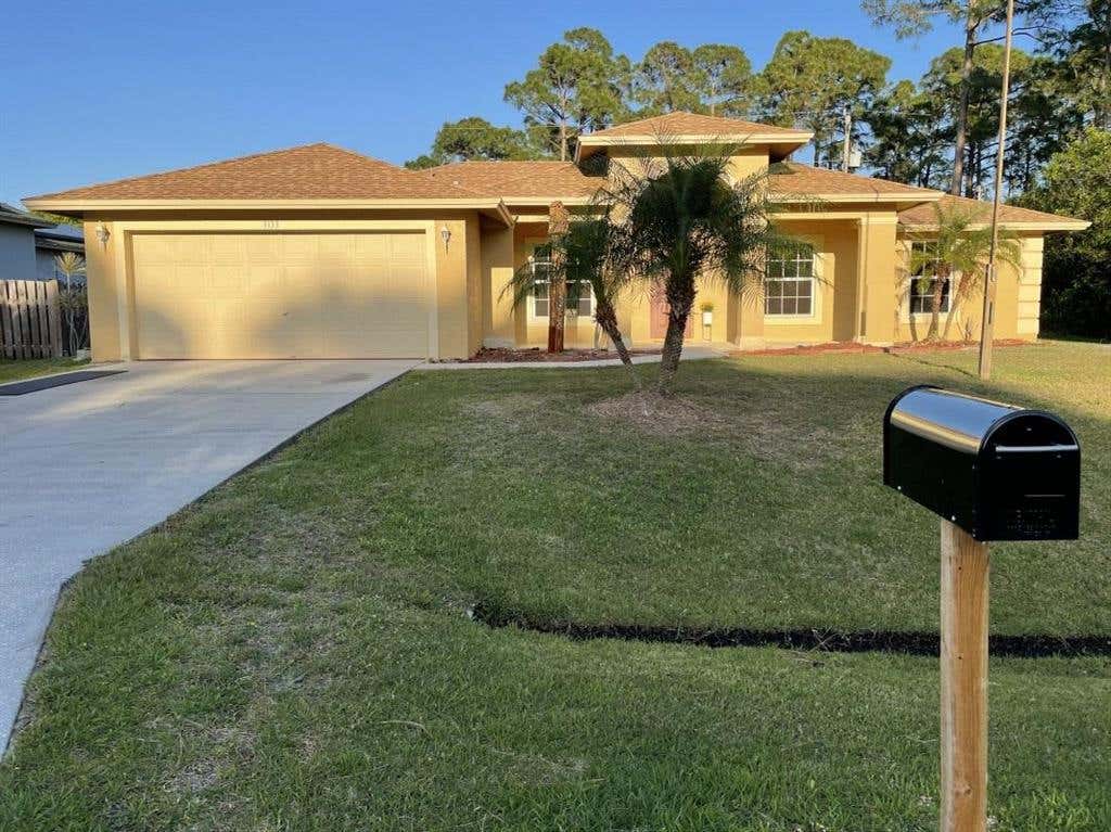 Photo of 3133 SW Armucher Street, Port Saint Lucie, FL 34953 (MLS # R10710209)