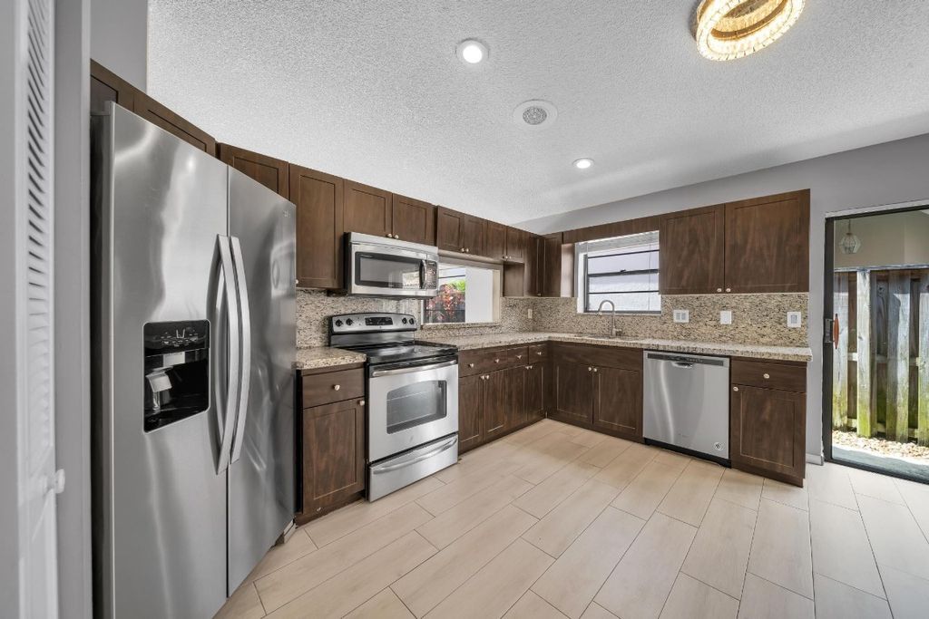 Photo of 2670 Towle Drive, Palm Beach Gardens, FL 33410 (MLS # F10459211)