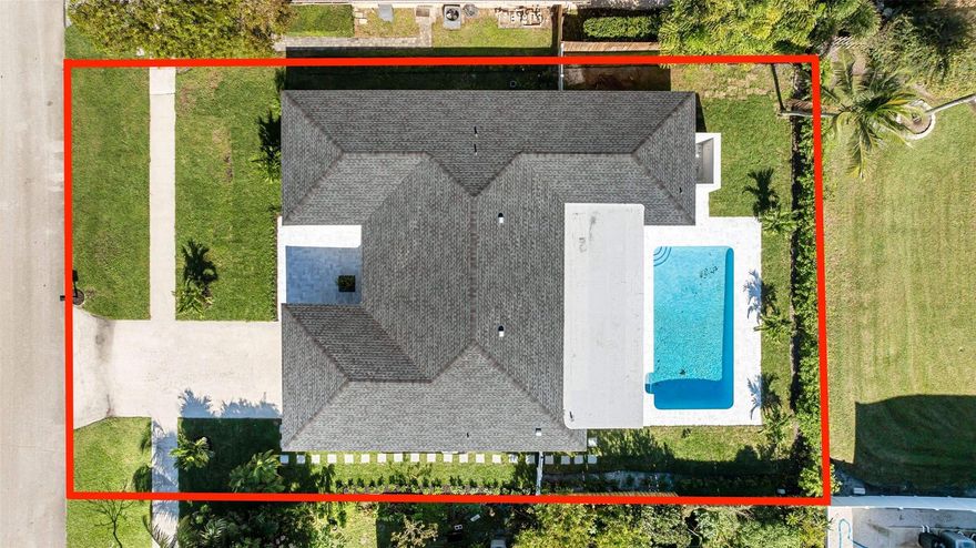 Fantastic chance to reside in a sought-after Eastside enclave in Boca Raton. This 4-bed, 3.5-bath rivals new construction with a complete top-to-bottom makeover—new roof, new floors, and more! Revel in a stunning gourmet kitchen equipped with top-notch features, from a pot filler above the stove to a custom beverage cooler, island, and designer bar. Living & Dining spaces boast a beautiful open concept, ideal for contemporary living. Enjoy the fresh aesthetic with new ceramic flooring and upscale designer Bathrooms. Step onto the covered patio overlooking the revamped pool with a custom outdoor shower cabana. The property has new impact windows and doors, including the garage. The electric and plumbing have been thoroughly updated, making this residence an exceptional opportunity.