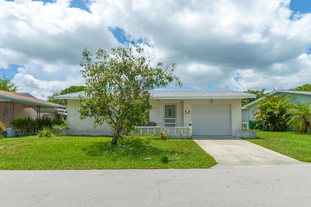 Photo of 4500 NW 47th Court, Tamarac, FL 33319 (MLS # B26065335)