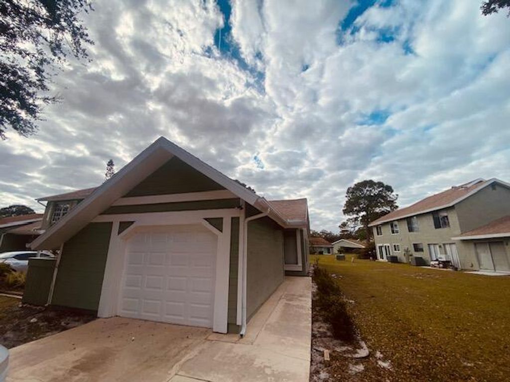 Photo of 1333 SE Rivergreen Circle, Port Saint Lucie, FL 34952 (MLS # R11058436)