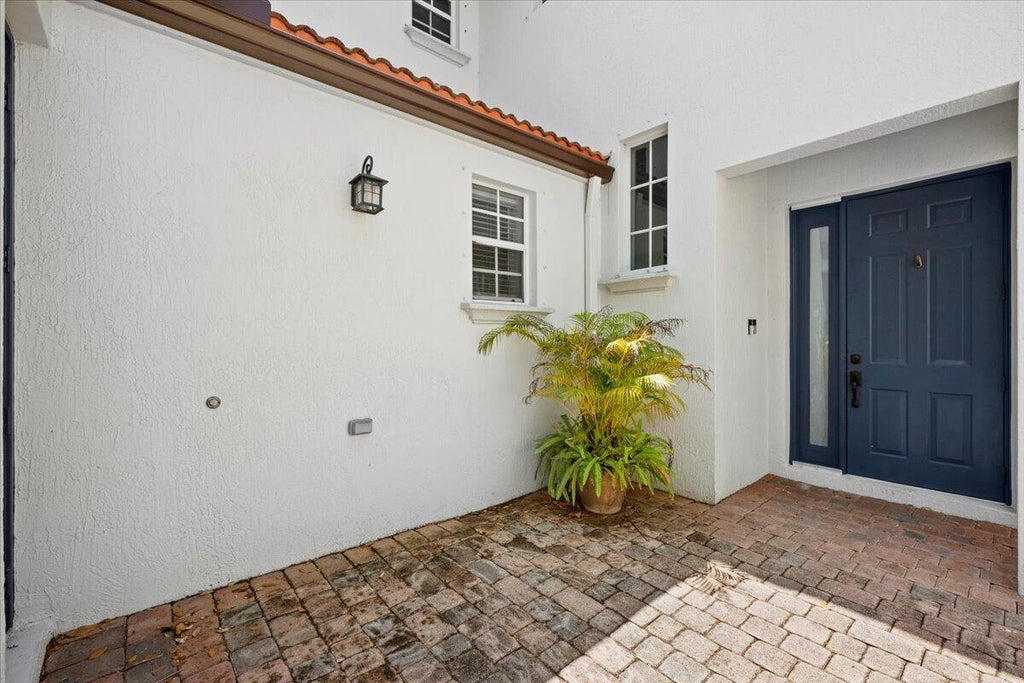 Photo of 956 Mill Creek Drive, Palm Beach Gardens, FL 33410 (MLS # B26045305)