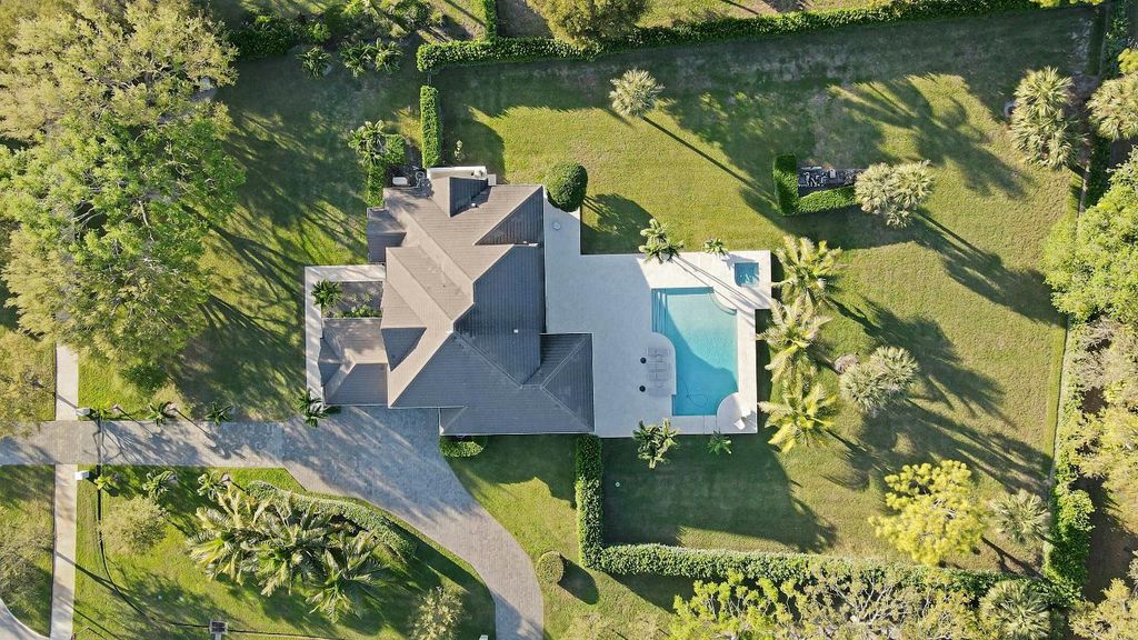 Photo of 7750 Steeplechase Drive, Palm Beach Gardens, FL 33418 (MLS # R11071113)