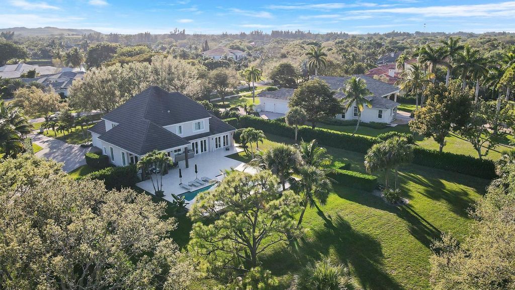 Photo of 7750 Steeplechase Drive, Palm Beach Gardens, FL 33418 (MLS # R11071113)