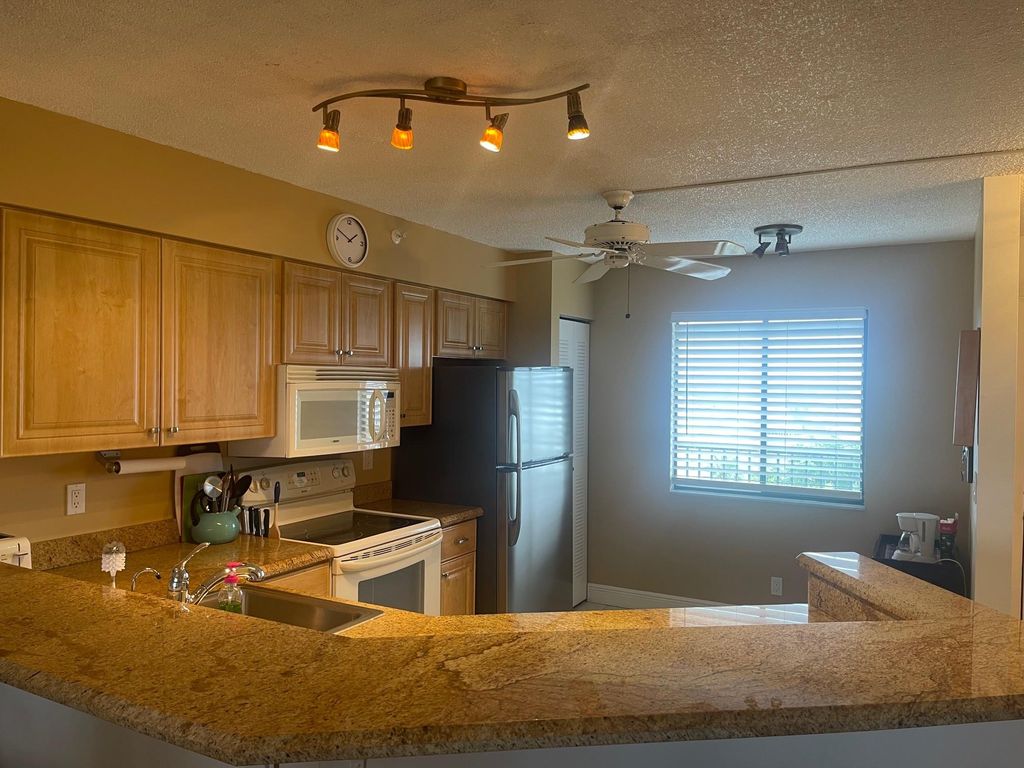 Photo of 2112 S Cypress Bend Drive #805, Pompano Beach, FL 33069 (MLS # F10466355)