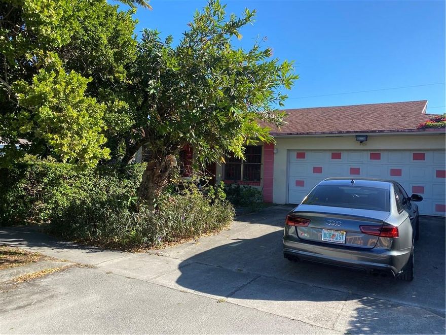 Perfectly located Home. Across from Public School Very safe area.  Home sits on a 15,200 sq. ft. double lot.  3/2 Home with Screened Patio area.  Home features Back up generator.  Home has a 2 car garage with 2 car drive way.     Property features fruit trees and room to build another home for the in laws.  Home has good bones and needs updating.  Home is being sold with additional lot as a package deal.  A must see a once in a life time opportunity.Great place to raise a family.