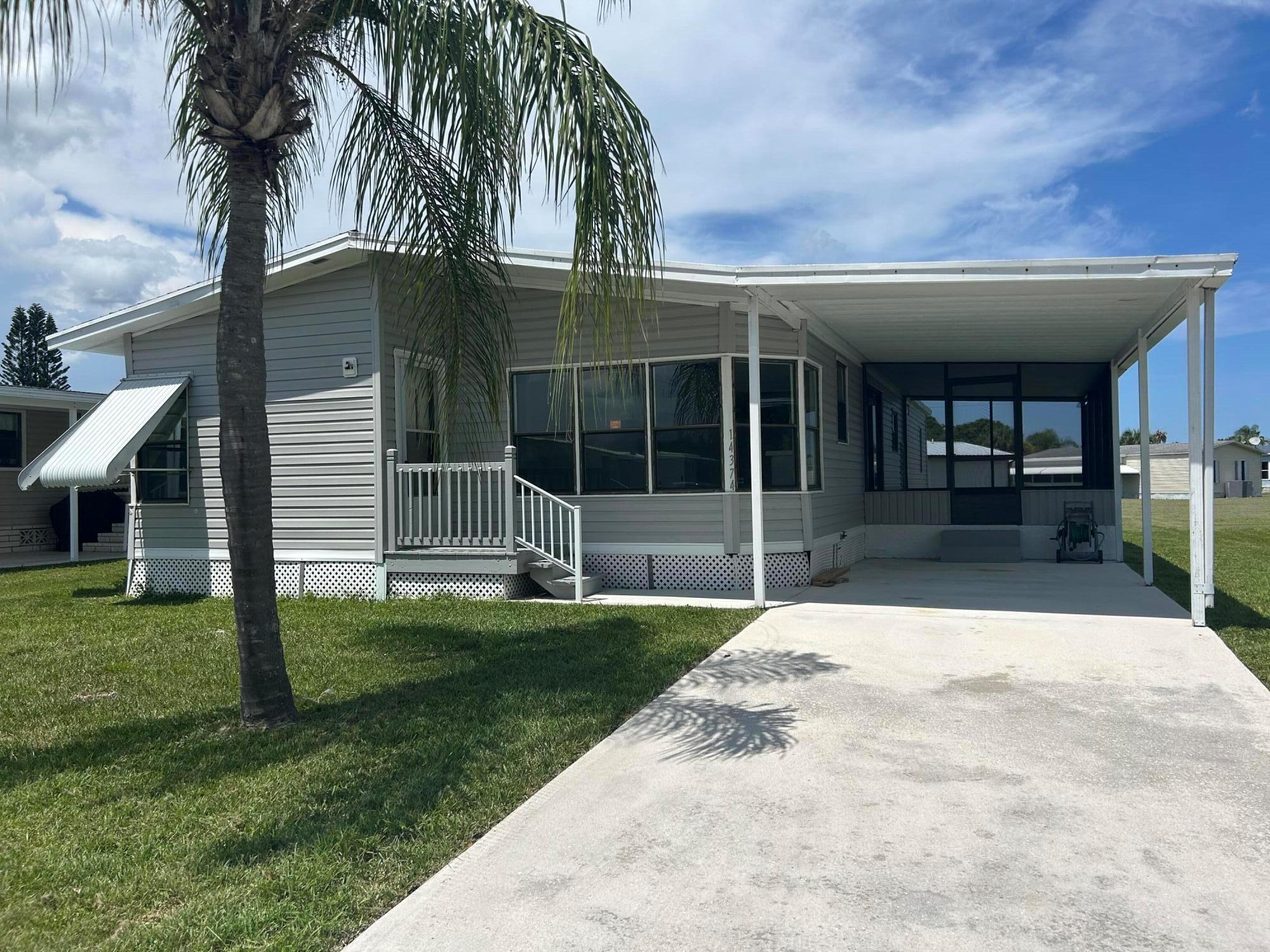 Welcome to 14374 Cancun Ave, a spacious and well-maintained mobile home located in the desirable Spanish Lakes community. This large home is move-in ready and comes complete with all major appliances, including washer and dryer. Enjoy the easy maintenance of laminate flooring throughout, and relax in the peace and privacy of your oversized backyard--perfect for gardening, entertaining, or simply soaking up the Florida sunshine.One of the biggest highlights of this property is the ultra-affordable lot rent--just $699/month, one of the lowest in the area. Plus, the home is being sold directly by Spanish Lakes, making the process straightforward and reliable.