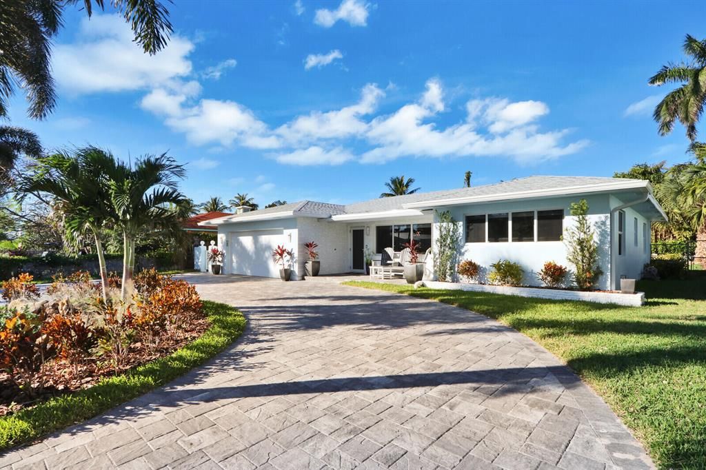 Photo of 337 Cascade Lane, Palm Beach Shores, FL 33404 (MLS # R10718327)