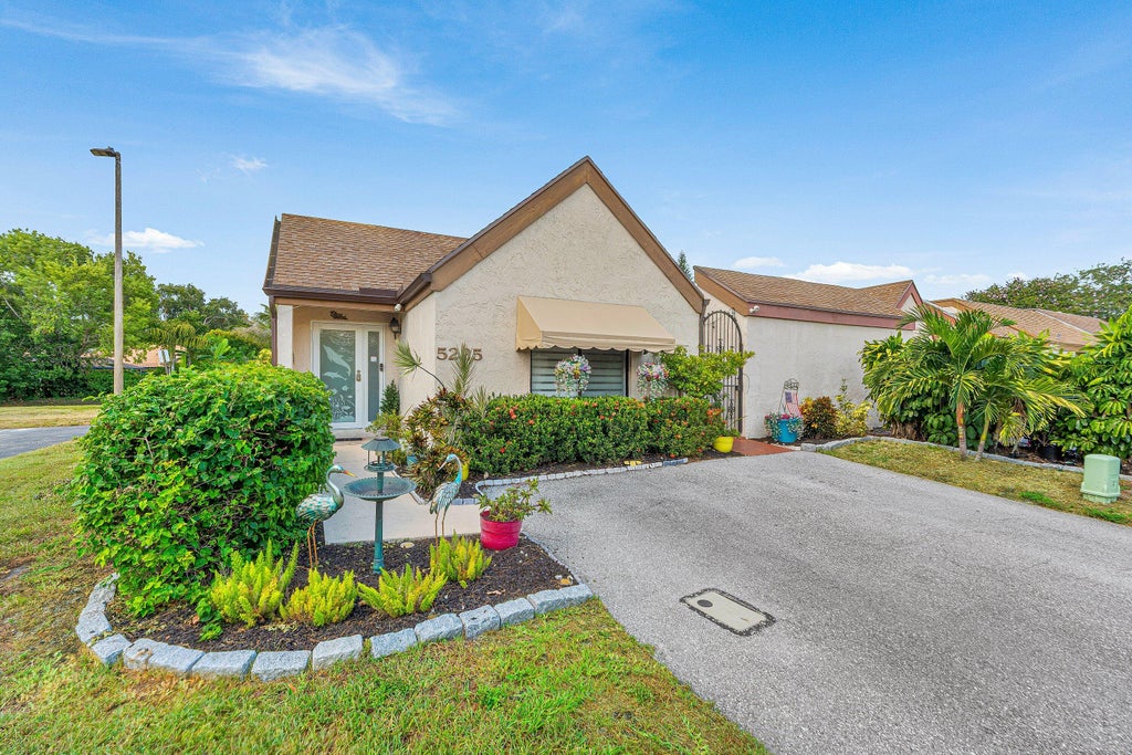 Photo of 5225 Spice Drive, Palm Beach Gardens, FL 33418 (MLS # B26067189)