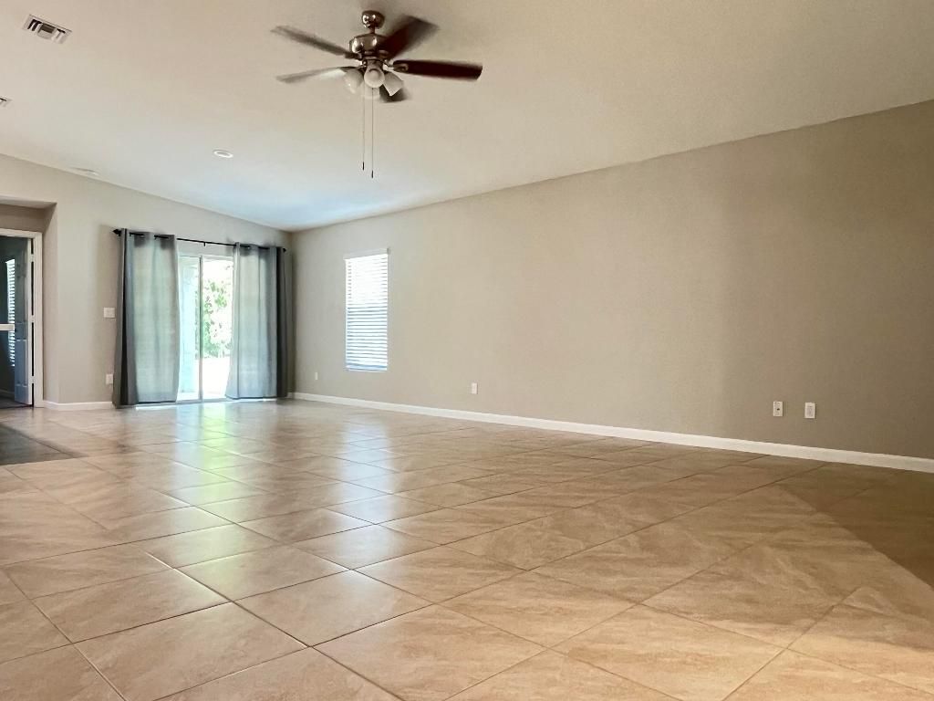 Photo of 1133 SW Ingrassina Avenue, Port Saint Lucie, FL 34953 (MLS # R11143968)