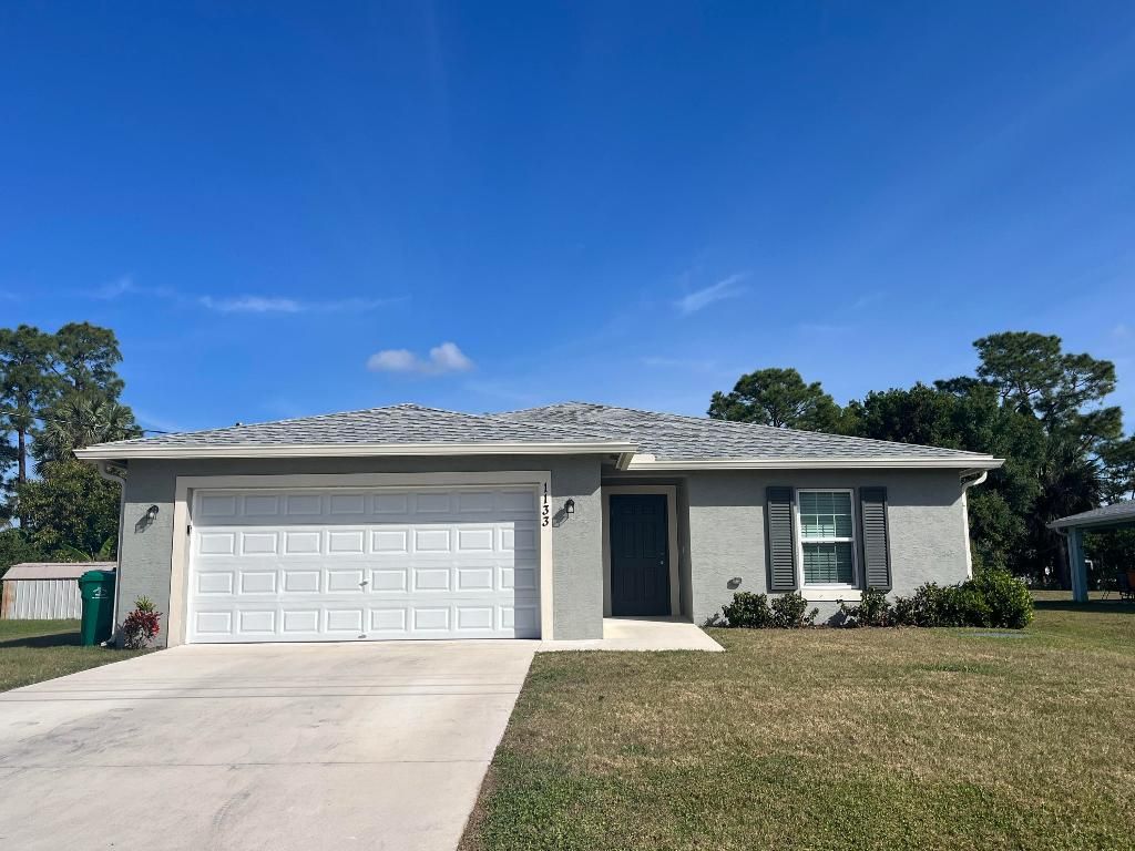 Photo of 1133 SW Ingrassina Avenue, Port Saint Lucie, FL 34953 (MLS # R11143968)