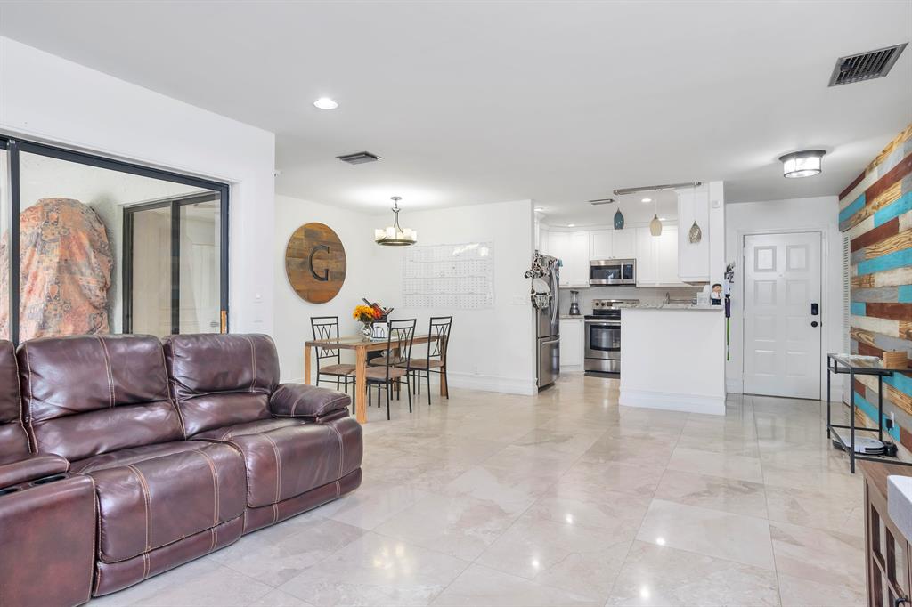 Must see this amazing 3/2 in Coconut Creek. Beautifully remodeled unit in Karanda Village in the highly desirable Township. Enjoy all the amenities that this development offers. Designer Kitchen, Updated bathrooms, beautiful tile throughout, and great spacious quiet screened in Patio. Centrally Located if commuting to work. Close to parks, restaurants, schools, and all Highways. Come see this one and call with any questions.