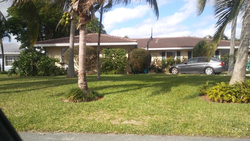 Gorgeous home with tile throughout.  Kitchen with SS appliances and one of a kind granite counter-tops.  Open floor plan, eat in kitchen and separate dining room.  Family room offers lovely french doors to covered patio.  One car garage, fenced in yard and all professionally landscaped.  Centrally located near I-95 and Congress for all your needs.  This one will not last.