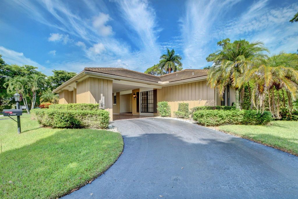 Photo of 755 Muirfield Circle, Atlantis, FL 33462 (MLS # R10926906)