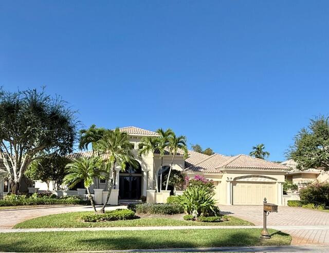 Single family home in the estate section Vintage Oaks of The Polo Club.