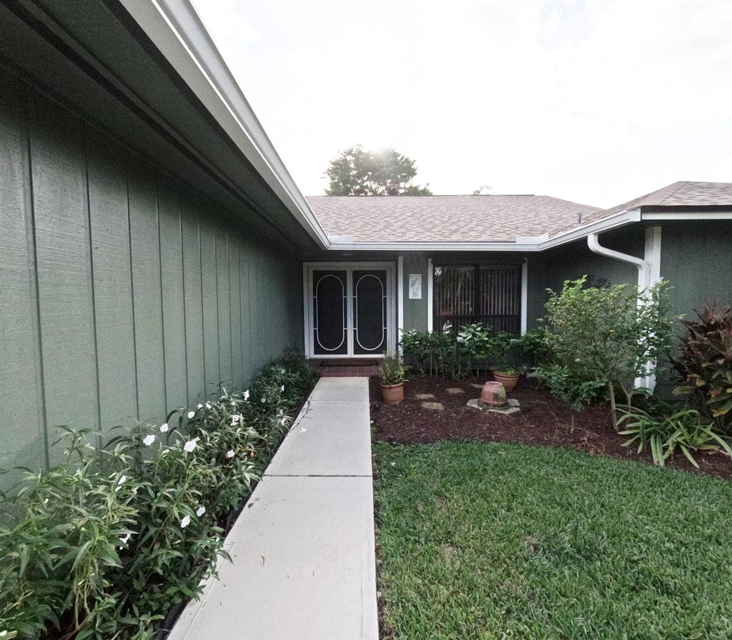 Photo of 7906 SE Trenton Avenue, Hobe Sound, FL 33455 (MLS # R11037360)