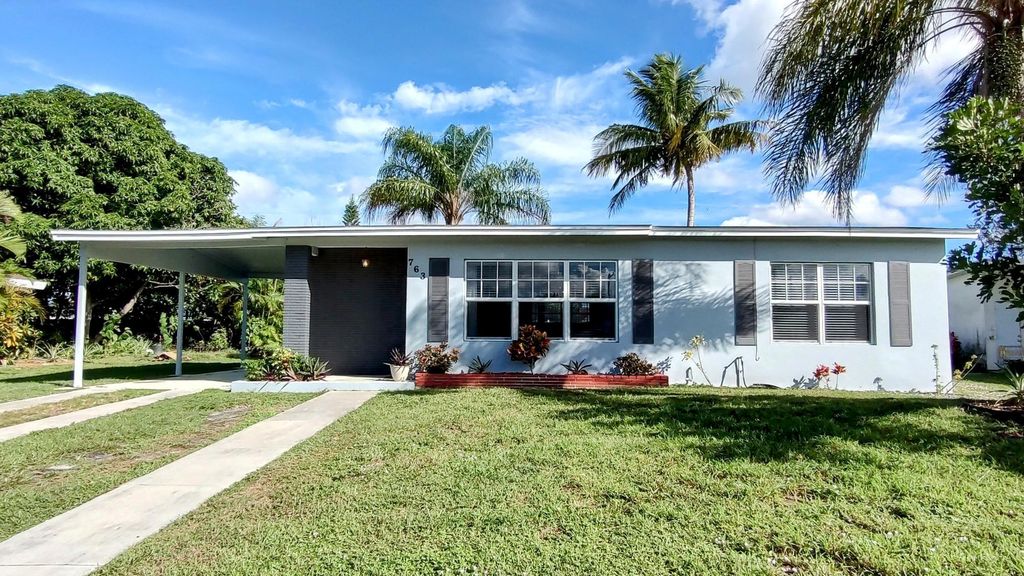 Photo of 763 SE Airoso Boulevard, Port Saint Lucie, FL 34983 (MLS # R10937032)