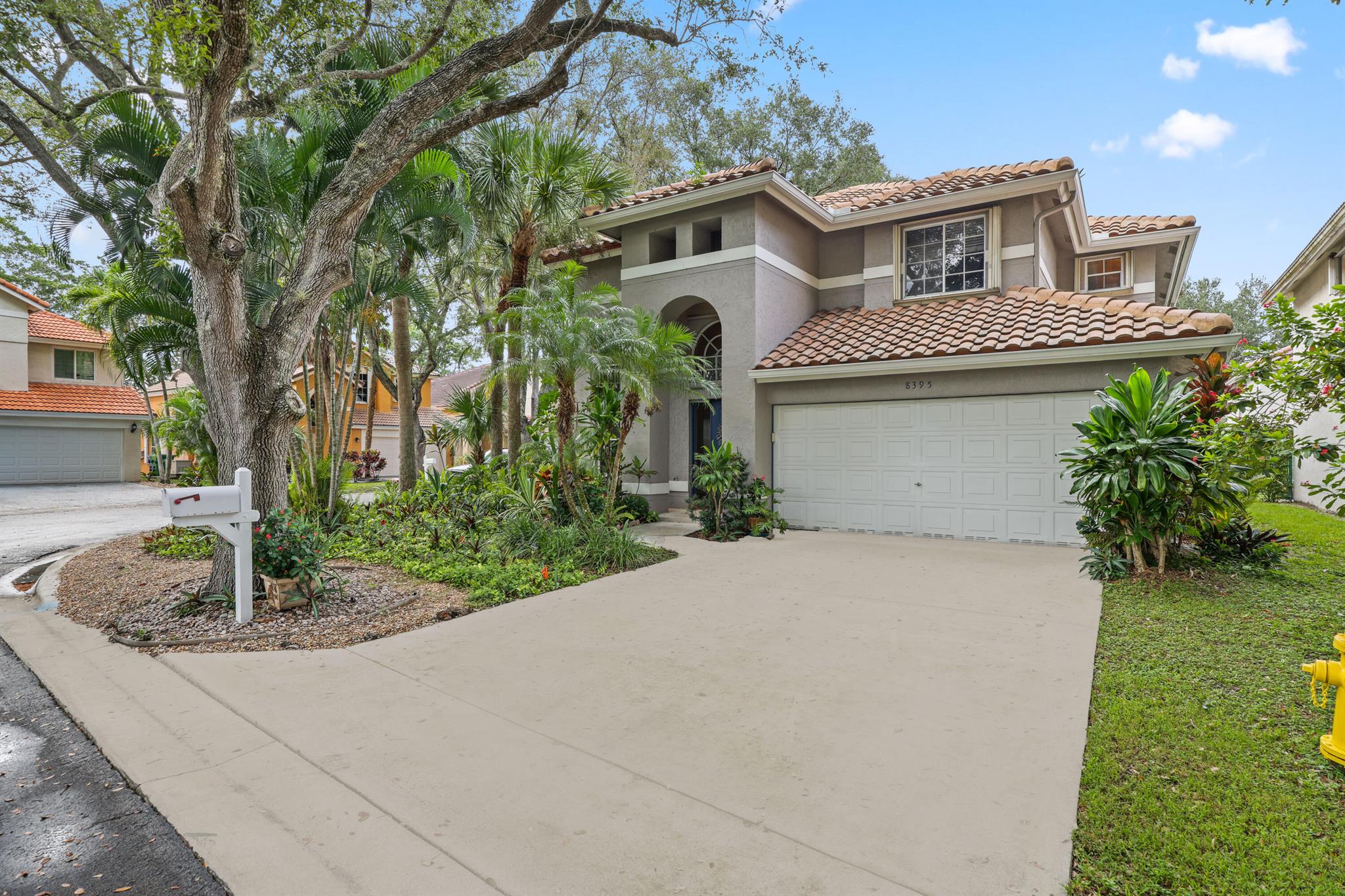 This spacious 4-bedroom, 3-bath in the beautiful community of Summerhill Estates in Coral Springs is waiting to become your new home. This private corner property offers high ceilings and plenty of natural light, and ample closet and storage space throughout. The first floor features one bedroom and a full bathroom--perfect for guests or an office--plus a laundry room with washer, dryer, and large storage closet. Upstairs are three generously sized bedrooms and two full bathrooms. The home includes accordion shutters and a 2021 roof so you can get a good homeowner's insurance rate. Located in a quiet neighborhood close to major highways, shops, and dining. Relax and unwind on the screened-in patio and enjoy Florida living at its best!