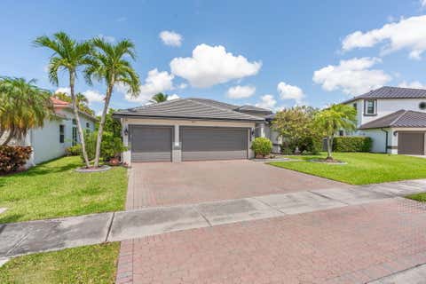 Photo of 5617 NW 106TH Way, Coral Springs, FL 33076 (MLS # B26052489)