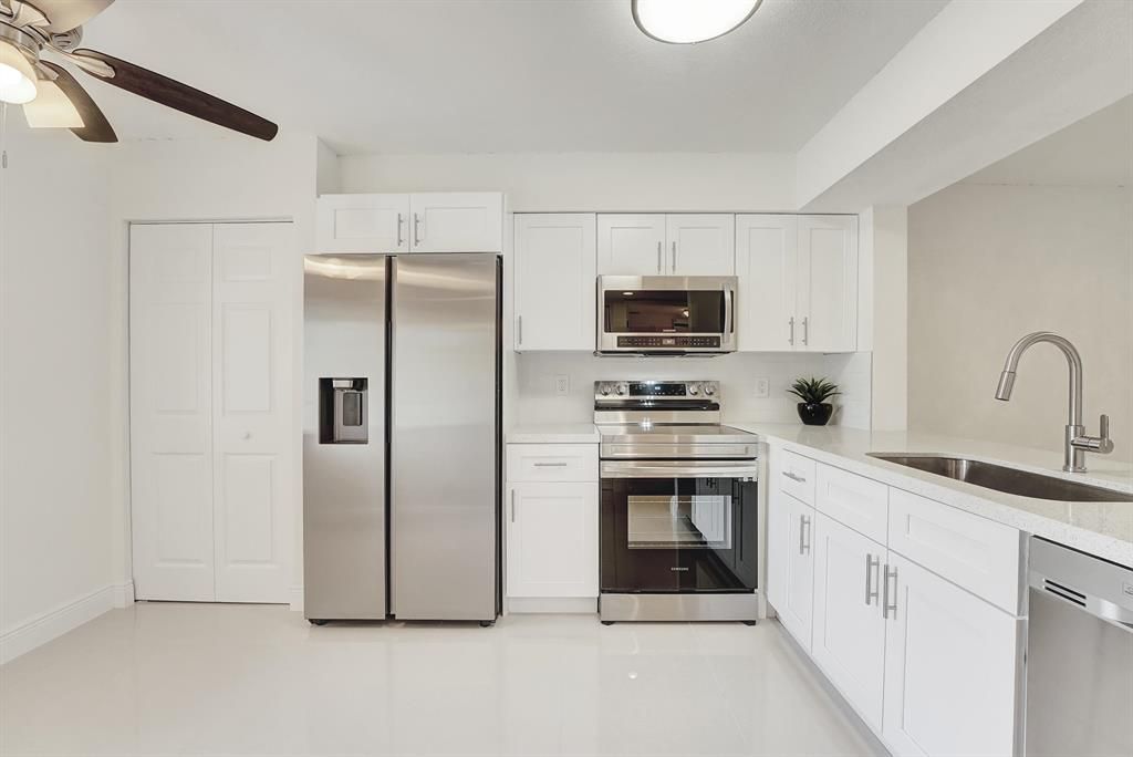 Photo of 7350 Kinghurst Drive #206, Delray Beach, FL 33446 (MLS # R10871816)