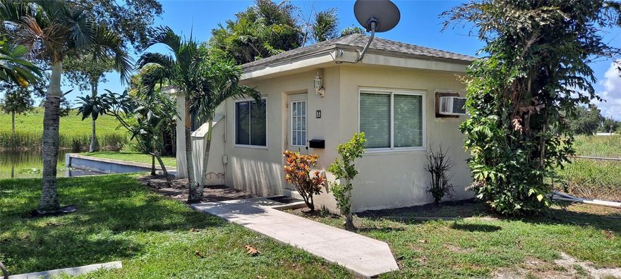 Waterfront cottage, 1 bed, 1 bath, with private waterfront patio. Rent includes electric, city water, sewer, direct tv satellite, lawn, and garbage. Window unit for AC. first, last, and security to move in. Back ground check required. NO pets allowed.