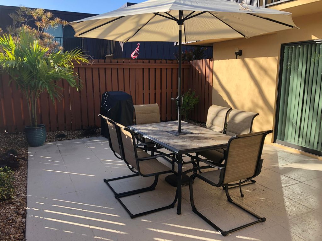 Photo of 5680 SE Windsong Lane #345, Stuart, FL 34997 (MLS # R10774810)