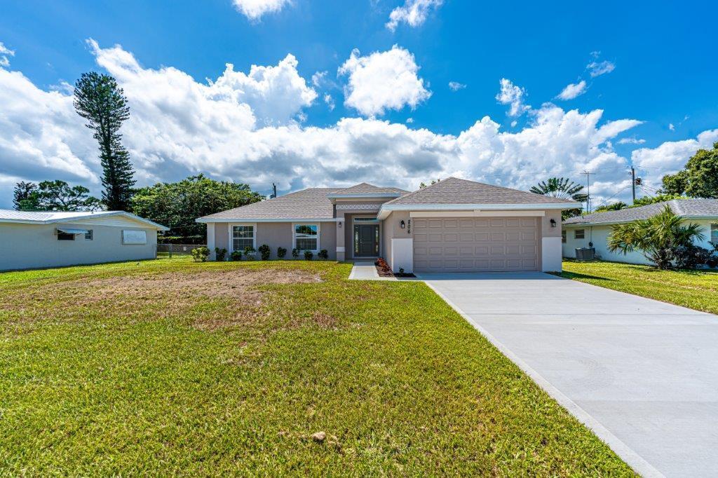 FLEX CASH AVAILABLE! ONLY $1,000 DEPOSIT. Save yourself several thousands of dollars in CLOSING COSTS WHEN USING THE SELLER'S APPROVED LENDER. Your new home is MOVE-IN READY and features 4 bedrooms, 2 bathrooms large walk in shower and a 2-car garage with vaulted ceilings, tile in main living areas and a large backyard view from your covered patio. Offering quick access to shopping, dining, parks, beaches & Treasure Coast Mall. Monthly payments starting at $2,700 P&I ONLY. Builder warranty Included.