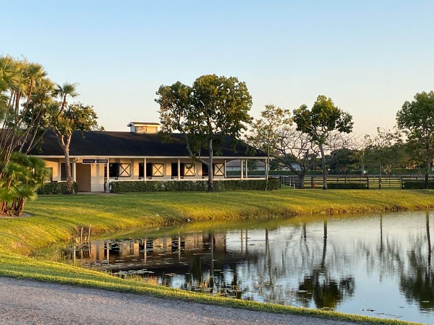 Spectacular Equestrian Stables on 20 acres just minutes from WEF. 2 Barns with 16 Stalls each overlooking the beautiful lake 12 Stalls available for season 2022/23.. Rider's Lounge. Tack Room and large Feed Room in each Barn. 8 Wash Stalls. 9 Paddocks. New footing Premier Pro-tex Oversize Sand Ring 150x300 & 7 acres irrigated all-weather Grass Field. Five Horses Walker. Round Pen. The price is for Season. Nov to April. 12 Stalls available for Season 2022/23.