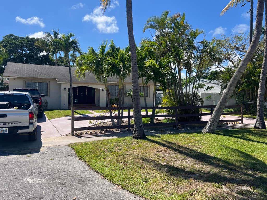 Photo of 5603 Parker Avenue, West Palm Beach, FL 33405 (MLS # B26059271)