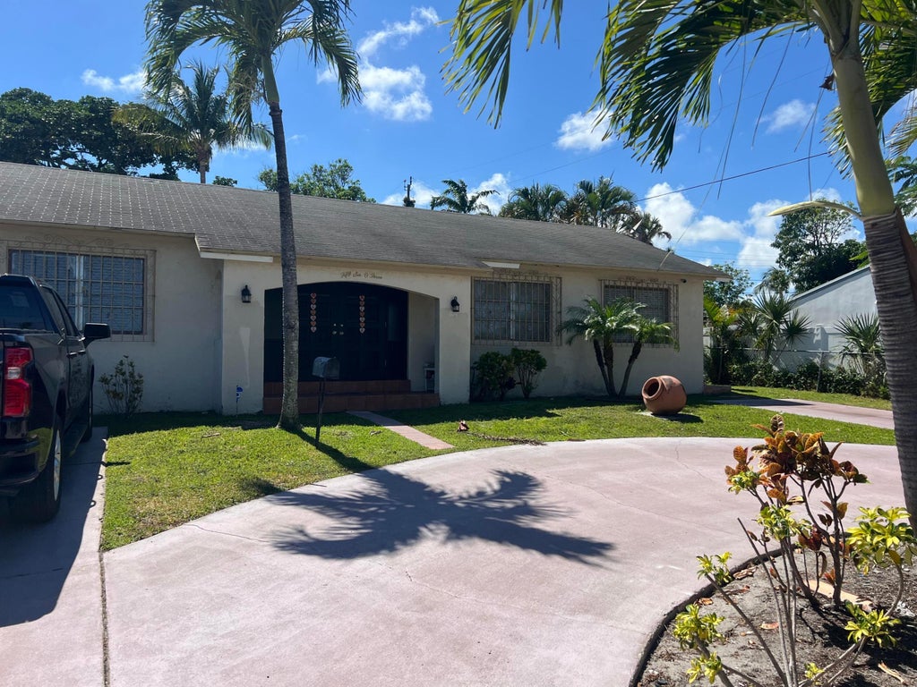 Photo of 5603 Parker Avenue, West Palm Beach, FL 33405 (MLS # B26059271)