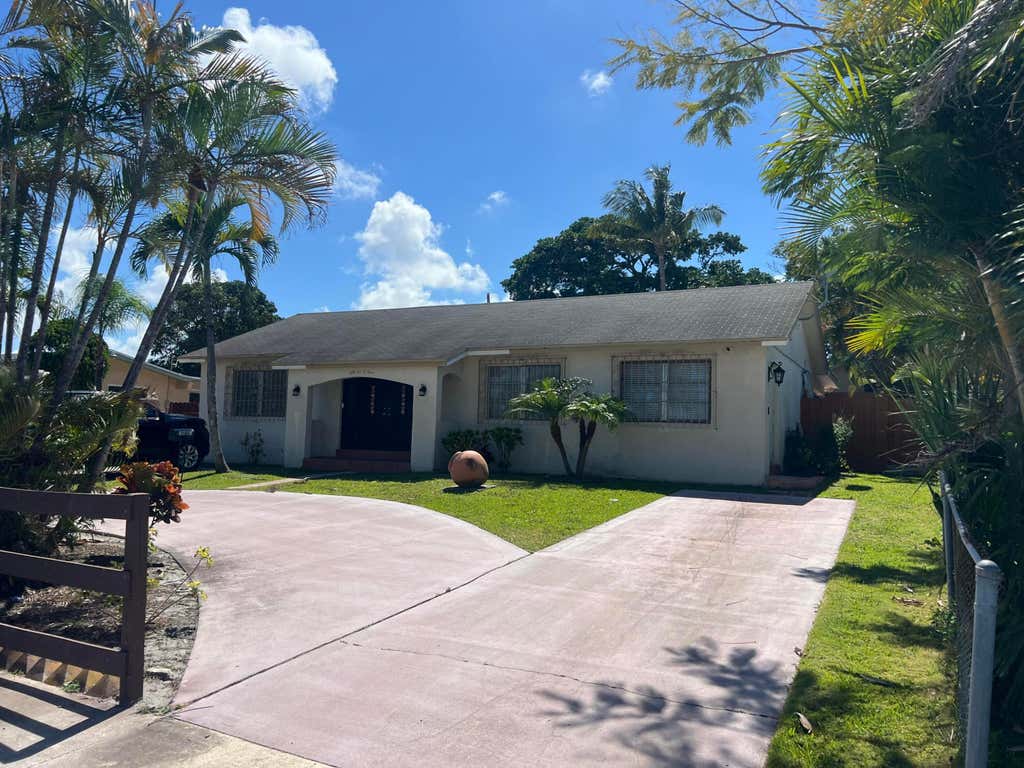 Photo of 5603 Parker Avenue, West Palm Beach, FL 33405 (MLS # B26059271)
