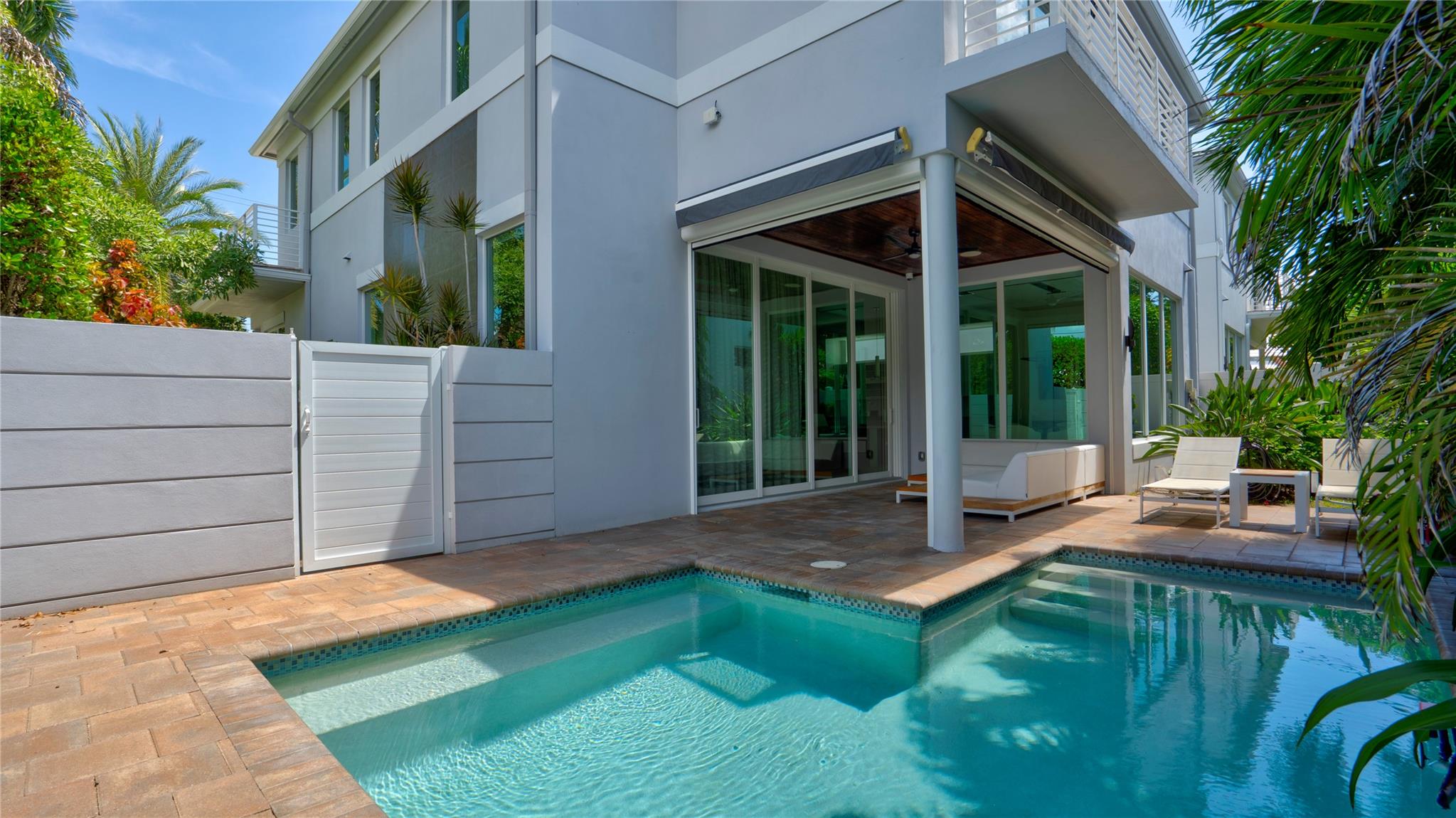 Exclusive Beach House Collection 2-Story Contemporary, Spacious Home in Desirable Dolphin Isles! Features/Amenities Upstairs 4-Bed/3-Full Bath, Downstairs Den/1-Full Bath, Living/Dining Areas w/Vaulted Ceilings, Oversized Chef Kitchen Outfitted w/High-End Appliances (Gas Cooktop) & Quartz Counters, Walk-in Closets & SPA-Like Bathroom w/Jetted Tub, Tile Flooring, Private Corner Lot w/High Impact Windows, 2-Car Parking Garage w/Built- in's & Epoxy Floor, Huge Wine Cooler in Garage, 2-AC Systems, Security Cameras Indoor/Exterior, Internet Access points interior/exterior, Pool Heater/Cooler - Salt Water New Pump Filtration, Softener/Purification System, Motorized Blinds/Patio Screens, Pool Retractable Awnings, Full Speakers, Lights, Security & Alarm, 5 minute walk to new Publix and beach!