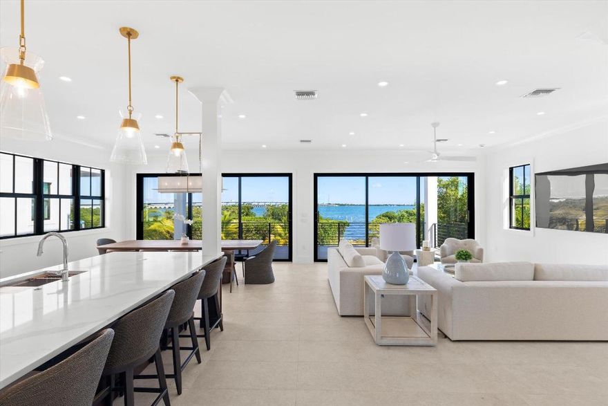 Introducing Seven Palms Cove, a one-of-a-kind new construction community that redefines luxury island living. With only seven exclusive residences available—each starting at $4 million—this private enclave offers a rare opportunity to own a slice of paradise just minutes from the heart of Key West.

Each state-of-the-art home spans over 4,000 square feet and features 5 spacious bedrooms, 5.5 elegantly designed bathrooms, open balconies, and your own private rooftop terrace with sweeping water views. Built with impact glass throughout and outfitted with top-of-the-line appliances and finishes, these homes offer modern sophistication at every turn. Step outside to your own sparkling infinity-edge pool positioned right on the water, and enjoy direct access to the sea from your assigned dock space in a private boat basinperfect for boating enthusiasts.

This gated, oceanfront community is ideally located just a block from a private airport that accommodates small aircraft, adding a level of convenience few properties can match. You'll also enjoy resort-style amenities, including on-site pickleball courts and a serene waterfront atmosphereall while being just a short drive to the shops, restaurants, and attractions of Key West.

For investors, Seven Palms Cove is an absolute dream. There are no rental restrictions, and similar properties just across the street are bringing in over $300,000 in annual income. Whether you're looking for a luxury vacation home or a high-performing investment property with incredible short-term rental potential, this community offers unmatched flexibility and return potential.

Whether you're searching for a forever home, a tropical getaway, or a high-yield asset in the Keys, Seven Palms Cove delivers the perfect blend of comfort, exclusivity, and opportunity.

Call us today for pricing details and to schedule your private tour of this exceptional waterfront retreat.