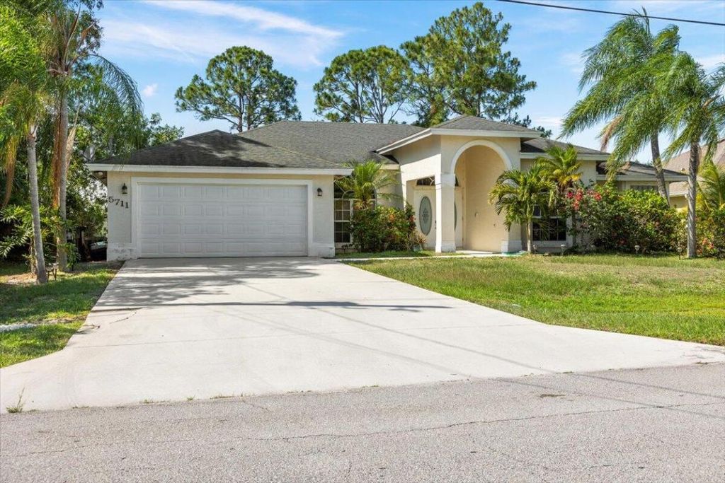 Photo of 5711 NW Zenith Drive, Port Saint Lucie, FL 34986 (MLS # R10997201)