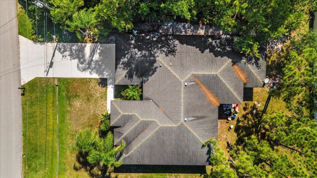 Photo of 5711 NW Zenith Drive, Port Saint Lucie, FL 34986 (MLS # R10997201)