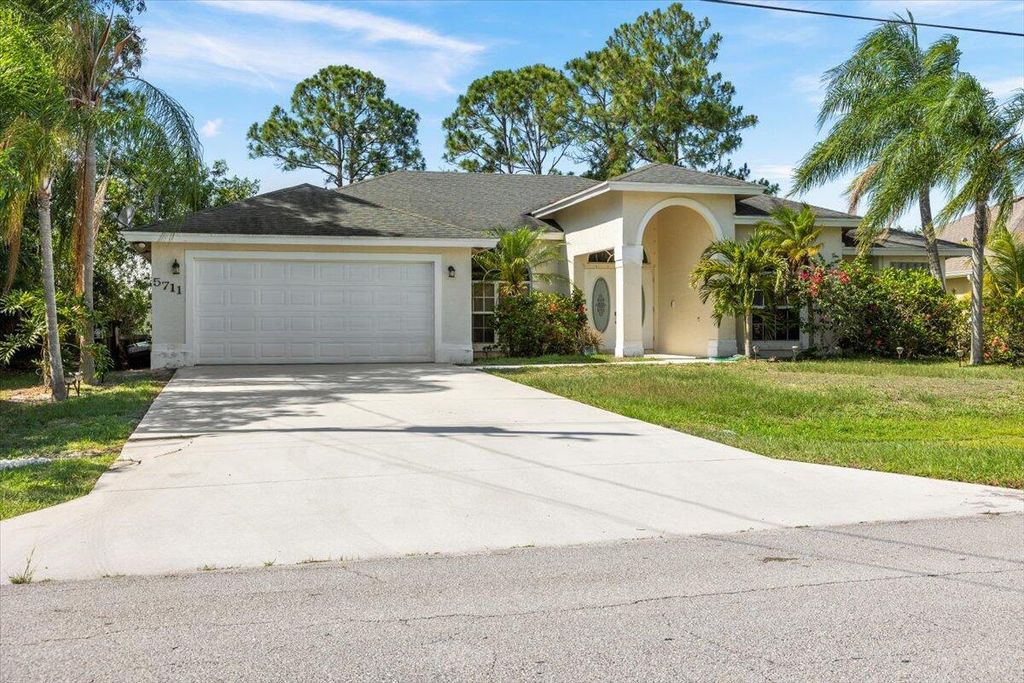 Photo of 5711 NW Zenith Drive, Port Saint Lucie, FL 34986 (MLS # R10997201)