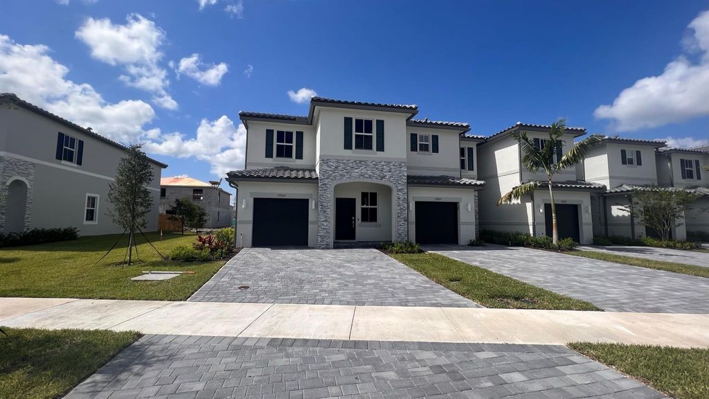 Photo of 11960 NW 47 Mnr #11960, Coral Springs, FL 33065 (MLS # F10533413)