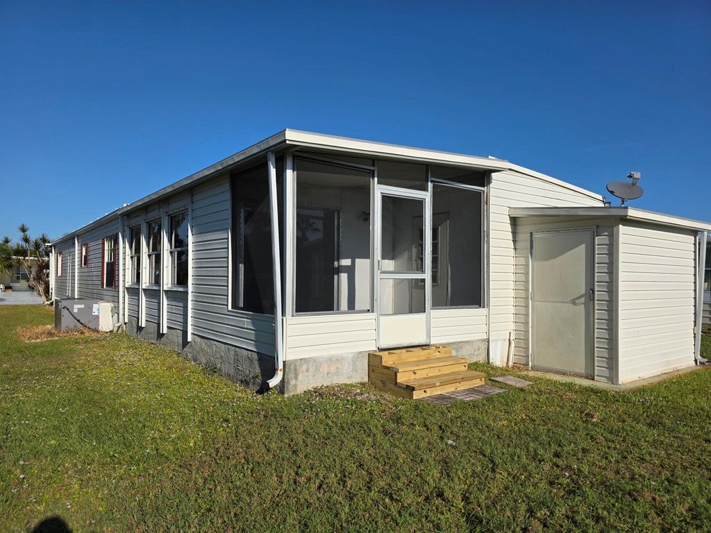 Photo of 8 Del Sol, Port Saint Lucie, FL 34952 (MLS # R11073949)