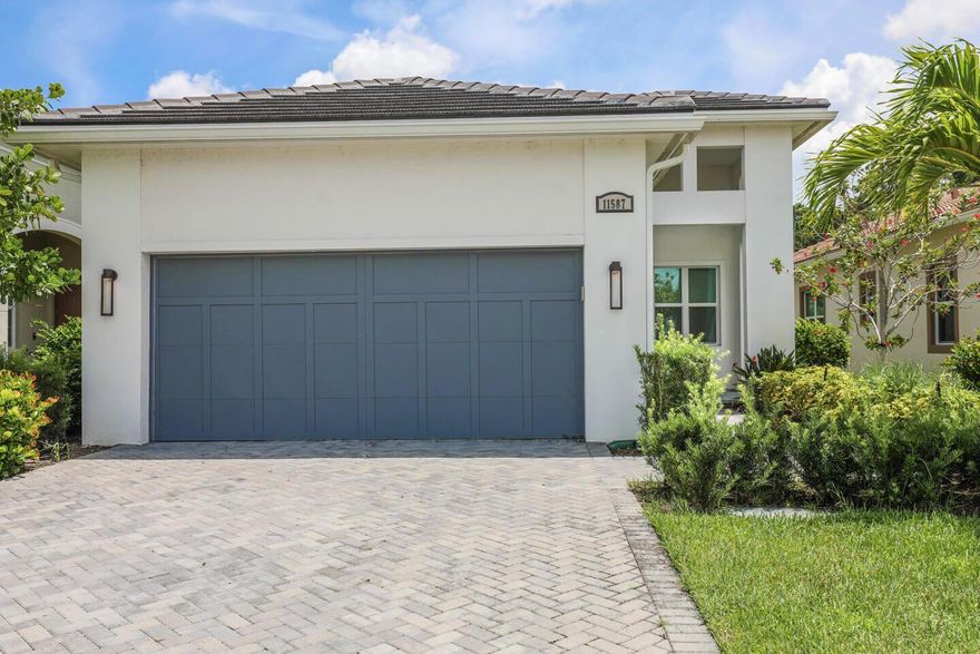 Beautiful 2 bed + den, 2 bath home with 2-car garage in the highly sought-after PGA Verano community in Port St. Lucie. This home offers a luxury feel throughout with 42'' cabinets, stunning stone countertops, and stainless steel appliances. The open-concept layout is perfect for entertaining, and custom lighting adds an elegant touch. Enjoy peace of mind with energy-efficient impact windows. Conveniently located near I-95 and Crosstown Parkway for easy commuting. Resort-style living at its finest!