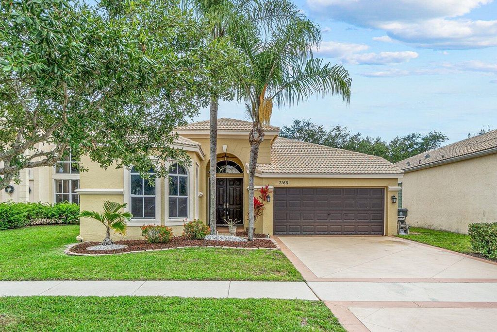 Photo of 7168 Copperfield Circle Cir, Lake Worth Beach, FL 33467 (MLS # R10796923)